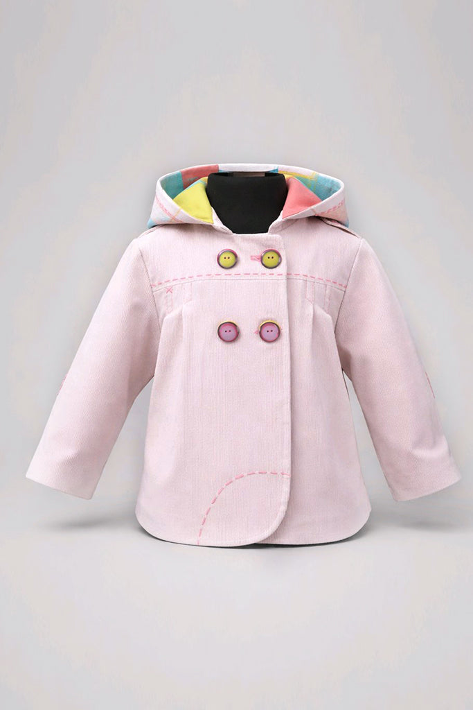 A light pink hooded jacket with colorful pastel lining details on the hood and front, featuring decorative buttons.