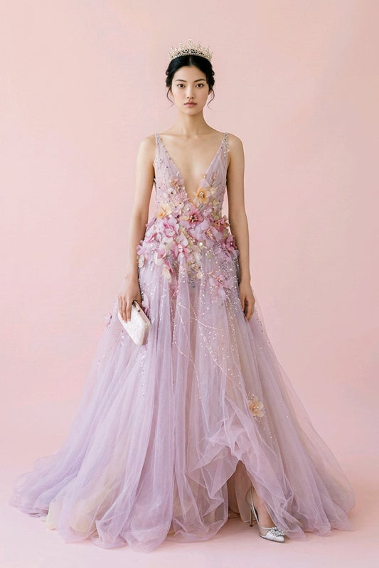 Woman wearing a floral pink gown against.