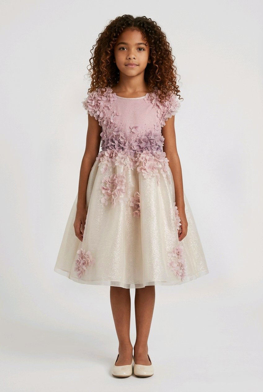 Young girl wearing a floral dress.